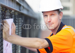 Construction_worker_working_at_a_building_site.jpg