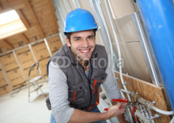 Plumber_working_in_home_being_renovated.jpg