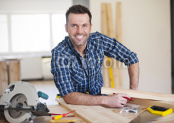 Smiling_construction_worker_at_work.jpg